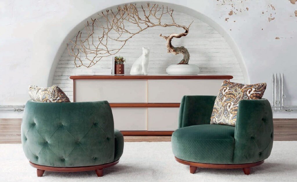 Sillón tapizado en verde